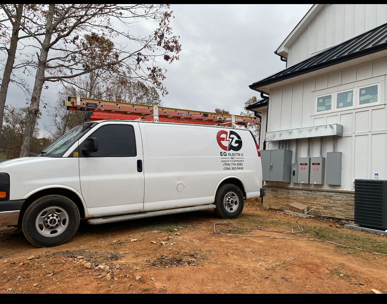 EG Electric service van parked at a panel upgrade job